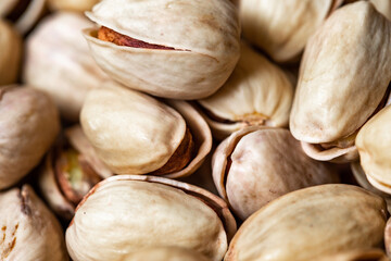 background of a group of pistachios close-up, macro