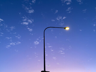 Dramatic Street Light Against Sky