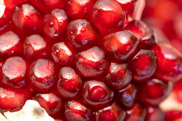 background of ripe pomegranate close-up, macro