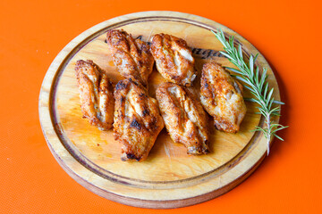 Chicken wings barbeque in a dish with BBQ grill sauce . Izgara tavuk kelebek sis kanat. Tavuk sis, gogus.