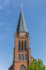 Fototapeta na wymiar Tower of the historic church of Nijverdal