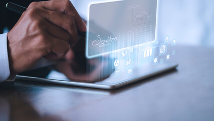 businessman use electronic pen sign signature on electronic  E-signing, data sheet document...