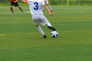 Obraz premium 少年サッカー試合風景