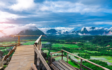 Top view of Beautiful Forest landscape of mist at pha Namxay Mountains Vang Vieng, Laos.