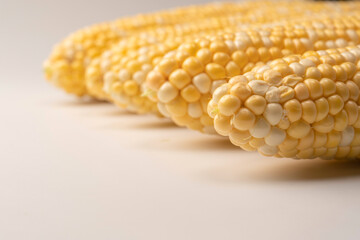 Yellow corn isolated on white background. Copyspace.