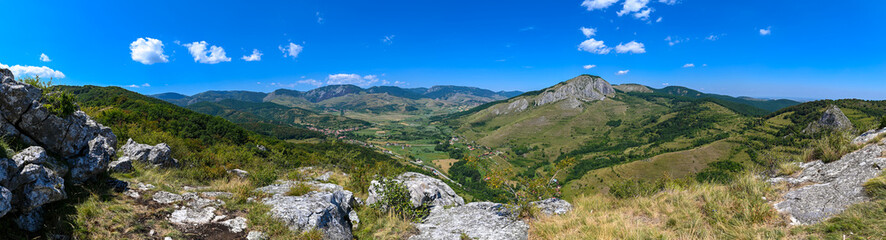 Fototapeta na wymiar Panoramic view of a Trascău Mountains in the western part of the Apuseni mountain range in Transylvania, Romania.