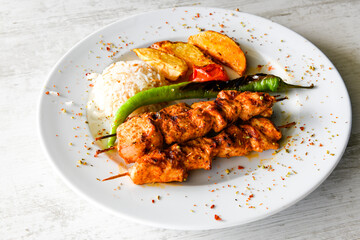Chicken wings barbeque in a dish with BBQ grill sauce . Izgara tavuk kelebek sis kanat. Tavuk sis, gogus.