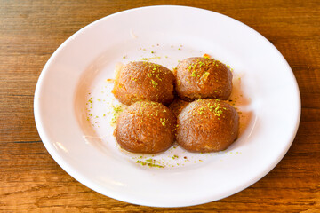 Turkish Dessert Sobiyet  Baklava, mussels baklava and classic baklava with Pistachio . Cevizli, Fistikli Baklava, top view.