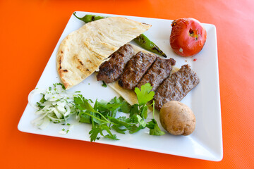 Meatball between bread (Turkish name : ekmek arasi kofte ) Izgara kofte. Manisa, Akcaabat, Akhisar  kofte