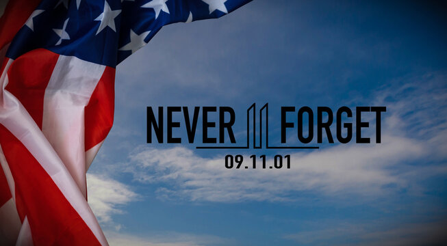 911 We will Never Forget text message with USA flag on wooden background
