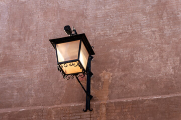 old street lamp on wall