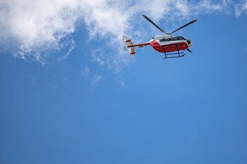 Fototapeta na wymiar Moscow, Russia - July 21, 2022: transport helicopter against the blue sky