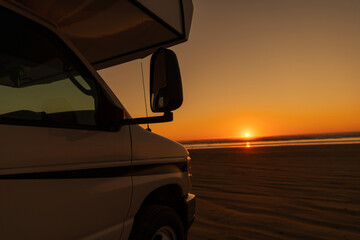 Fototapeta na wymiar Camper View of Beautiful Sunset at the Beach