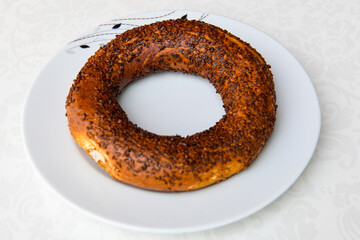 Turkish pastry product , tasty pogaca. Simit, gevrek. Turkish Pastries; peynirli, patatesli, kasarli pogaca, borek, acma, ay coregi at patisserie showcase.