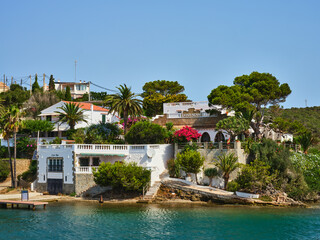 Architecture of houses on the coast of the port of Mahon (Mao) in Menorca, Spain