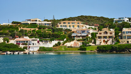 Fototapeta na wymiar Architecture of houses on the coast of the port of Mahon (Mao) in Menorca, Spain