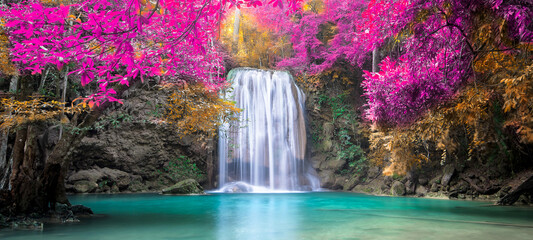 Amazing in nature, beautiful waterfall at colorful autumn forest in fall season	