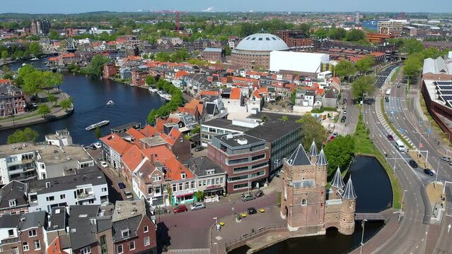 Haarlem near Amsterdam, Netherlands. Aerial view of picturesque dutch city Haarlem in the summer. Sailboats and yachts pass under the drawbridge. Famous place to visit in Holland.