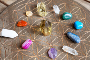 Healing crystals on brown background