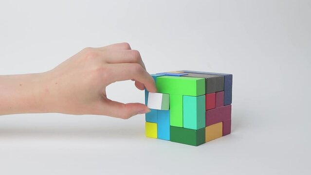 Finding solution, last step concept. Completing, finishing cube with matching missing element