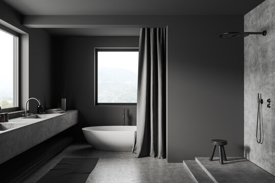 Grey bathroom interior with tub, douche and sink near panoramic window