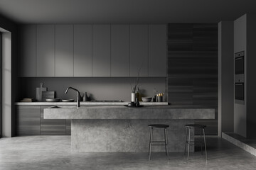Front view on dark kitchen room interior with island, barstools
