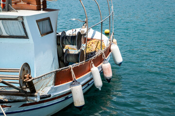 Fototapeta na wymiar Vintage fishing boat detail closeup in sunny day