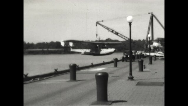 Float Plane Launch 1931 - A Consolidated P2Y float plane, belonging to the US Navy, is lowered to the water by crane at the US Naval Academy in Annapolis, Maryland in 1931. 