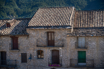 medieval styled stone built property, summer day