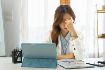 Successful business concept, Businesswoman feeling headache after working hard about new project