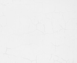Cracks on white painted wall. White background.