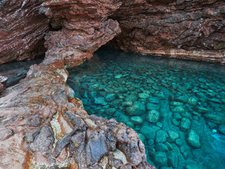 Sea cave near the island of Sveti Stefan in Montenegro.
