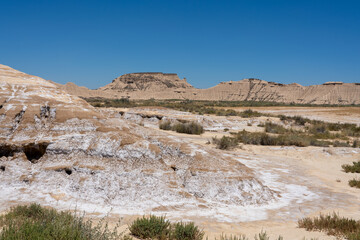 a semi-desert natural region or badlands composing clay, chalk and sandstone