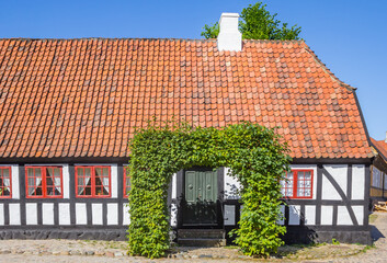 Fototapeta na wymiar Front facade of a white half timbered house in the historic city of Aarhus