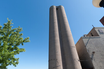 old grain silos and blue sky