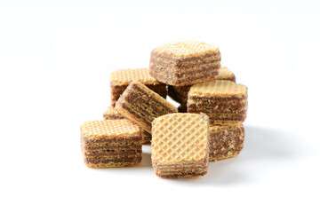 square chocolate wafer biscuits isolated on white background, bakery and snack