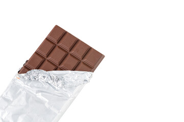 Milk chocolate bar in foil. isolated on white with cliping path