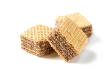 square chocolate wafer biscuits isolated on white background, bakery and snack
