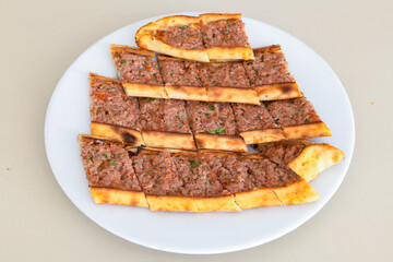 Kiymali pide. Turkish pide with minced meat. Turkish pizza mince pita Pide on white background. Etli ekmek. Kusbasi kasarli pide.