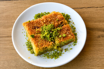 Turkish Dessert Sobiyet  Baklava, mussels baklava and classic baklava with Pistachio . Cevizli, Fistikli Baklava, top view.