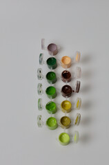 A set of multi-colored paints. Acrylic, gouache, watercolor, oil - paints for the artist. A set of paints of various colors for drawing with a brush