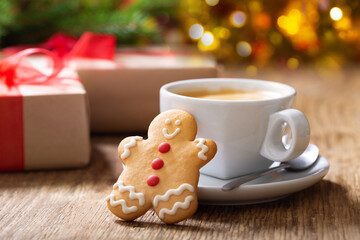cup of coffee with christmas cookies