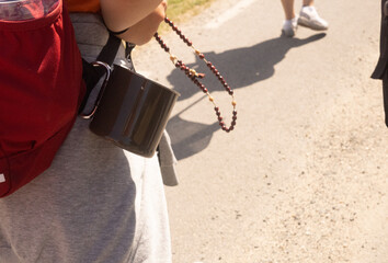 Boleslawiec, Poland, july 2022, unidentified pilgrims pray with a rosary on a pilgrimage to Czestochowa, Poland, summer 2022 © magdagalkiewicz