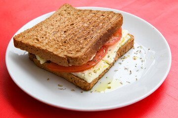 Turkish karisik atom  tost ( kasarli bazlama tost) . Flat baked bread toasted