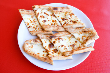 Kiymali pide. Turkish pide with minced meat. Turkish pizza mince pita Pide on white background. Etli ekmek. Kusbasi kasarli pide.