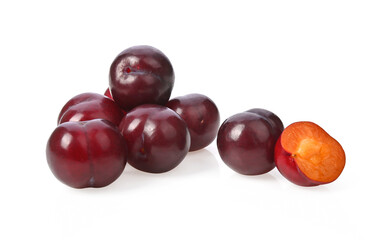 Red plums fruit on white background