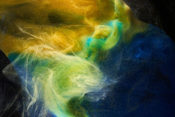 Liquid fluid art abstract background. Blue yellow dancing acrylic paints underwater, ocean space smoke © amixstudio