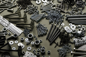 Set of bolts nuts nails metal fasteners. Consumable hardware tools. assortment steel screws collection close up background - Powered by Adobe