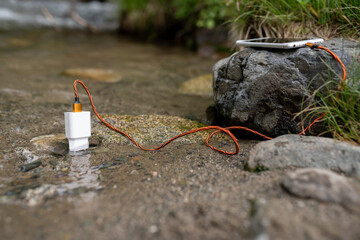 Charging a smartphone in water