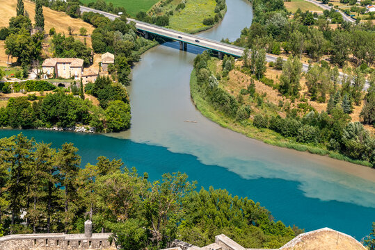 Confluence or conflux of the river Durance and the Buëch in Sisteron, France